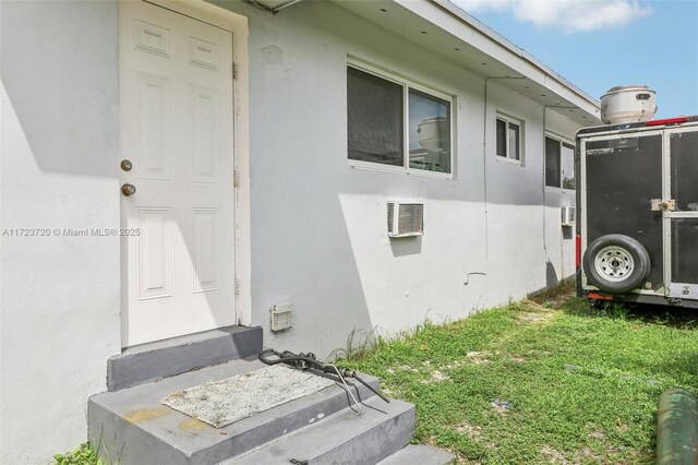 view of side of home featuring a yard