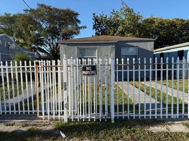 view of gate featuring fence