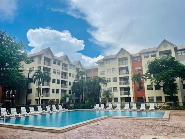 8290 Lake Dr Unit 235, Doral, FL 33166 - community pool featuring a patio area