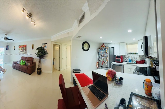 8290 Lake Dr Unit 235, Doral, FL 33166 - dining space with a ceiling fan, crown molding, a textured ceiling, light tile patterned floors, and recessed lighting