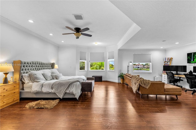 bedroom featuring ceiling fan, dark hardwood / wood-style flooring, crown molding, and a textured ceiling