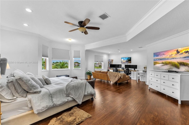 bedroom featuring ceiling fan, crown molding, and dark wood-type flooring