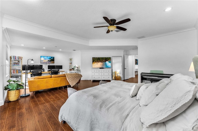 bedroom with ceiling fan, dark hardwood / wood-style flooring, and crown molding