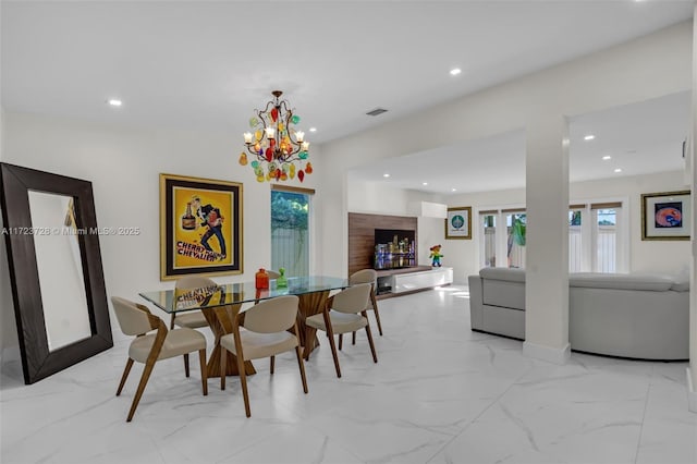 dining space with a notable chandelier