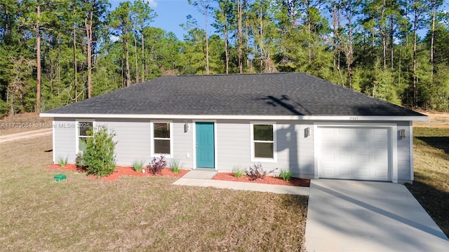 single story home with a front lawn and a garage