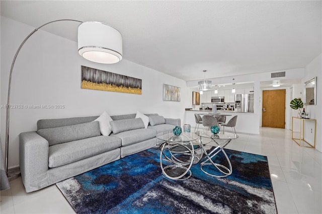 living room with light tile patterned floors