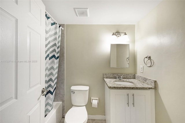 full bathroom featuring tile patterned floors, vanity, toilet, and shower / tub combo with curtain