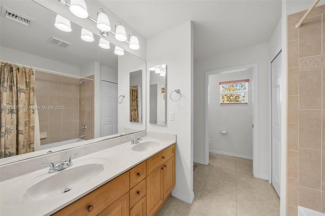 full bathroom featuring tile patterned flooring, vanity, toilet, and shower / bathtub combination with curtain