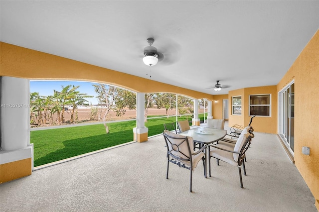 view of patio with ceiling fan