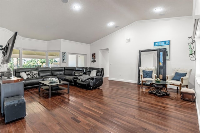 living room featuring crown molding, french doors, lofted ceiling, and dark hardwood / wood-style floors