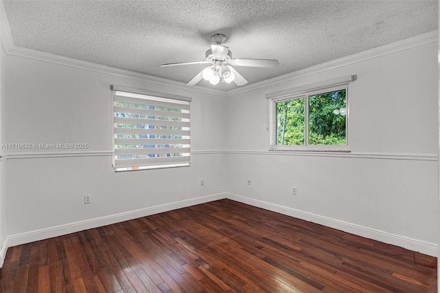 empty room with a textured ceiling, ceiling fan, crown molding, and dark hardwood / wood-style flooring