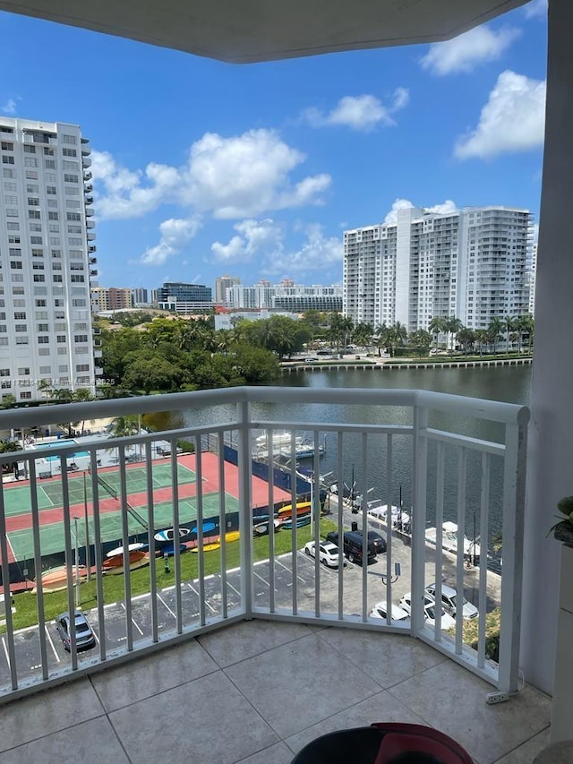 balcony featuring a water view