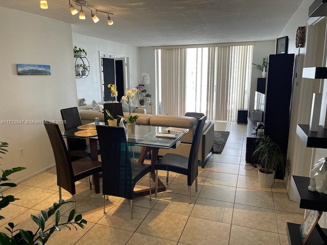 dining space with light tile patterned flooring