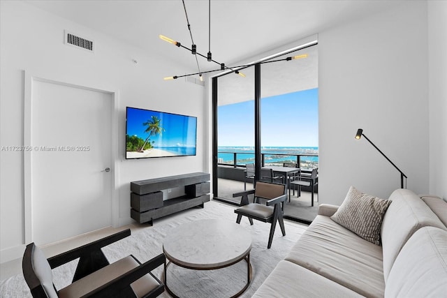 living room featuring expansive windows