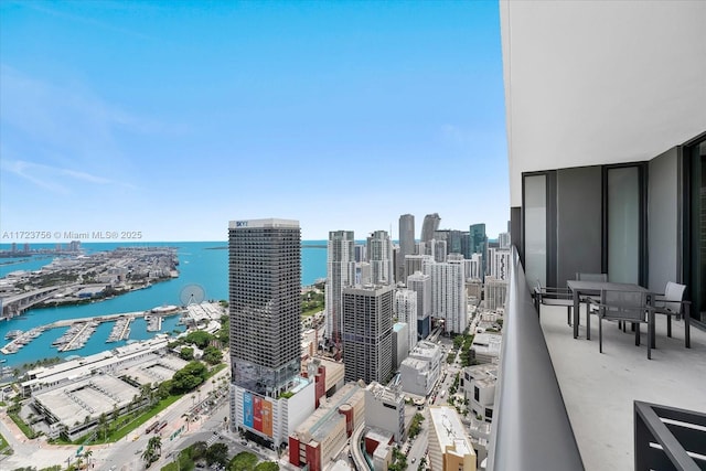 balcony featuring a water view