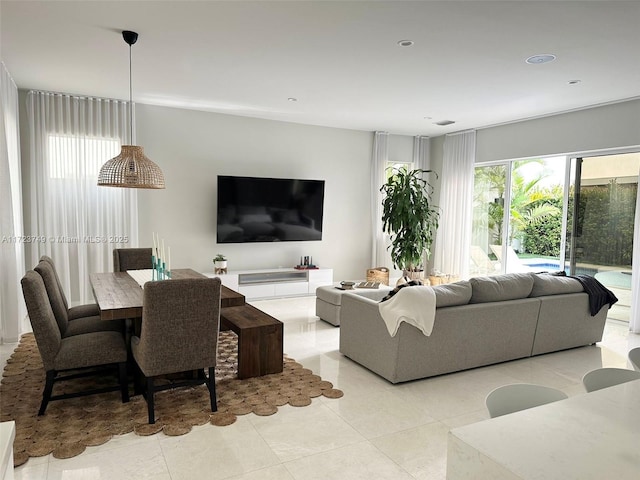 living room with light tile patterned floors