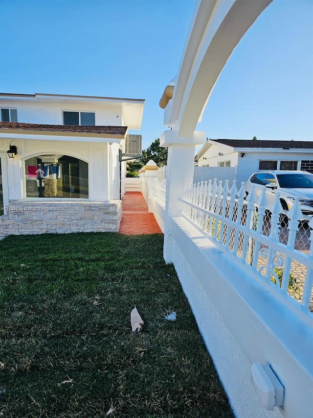 view of home's exterior featuring a lawn