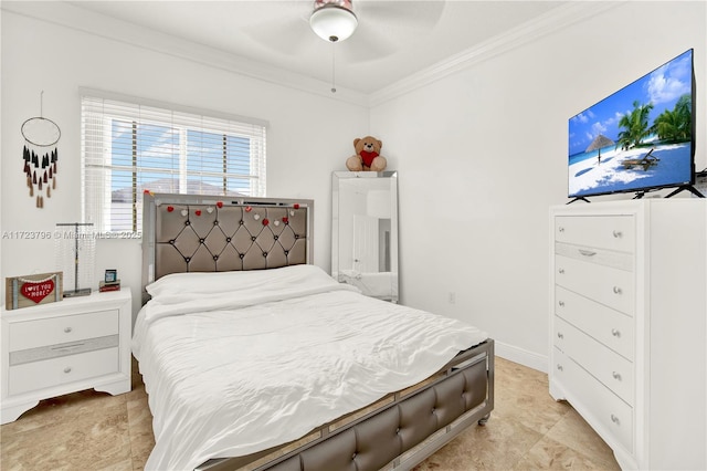 bedroom with ceiling fan and ornamental molding