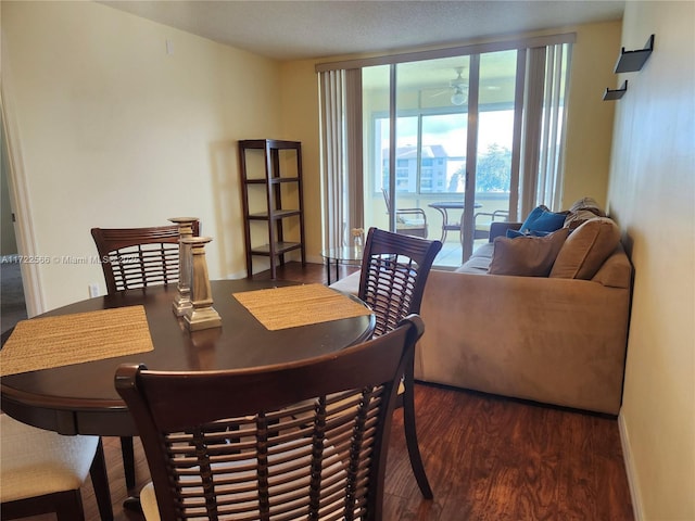 dining area featuring dark hardwood / wood-style floors