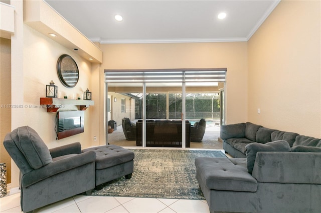 living room featuring ornamental molding and light tile patterned flooring