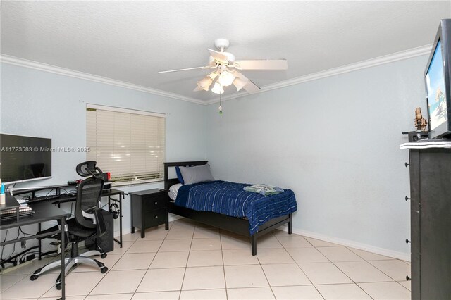 tiled bedroom with ceiling fan and ornamental molding