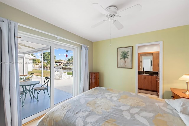 bedroom with ceiling fan and access to exterior