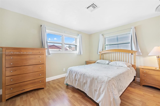 bedroom featuring light hardwood / wood-style flooring