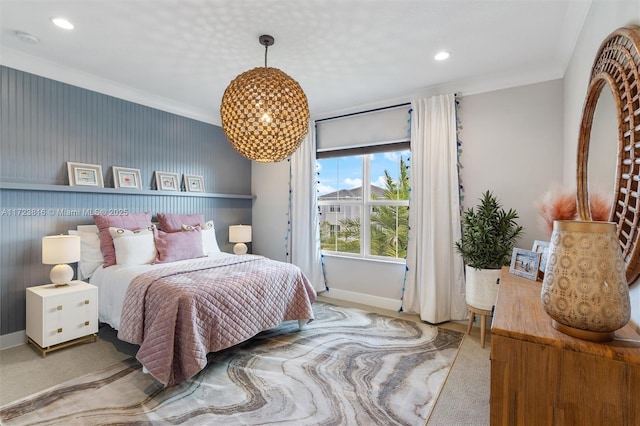 carpeted bedroom with crown molding