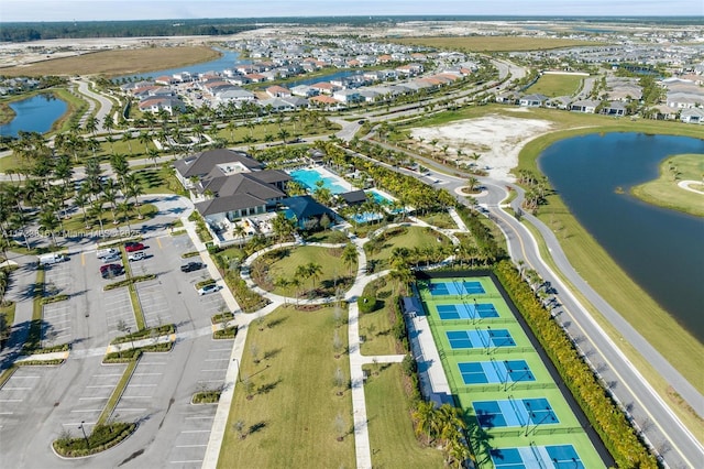 drone / aerial view with a water view