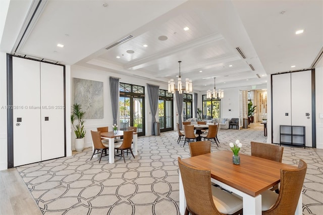 dining room with a notable chandelier, a wealth of natural light, french doors, and beamed ceiling