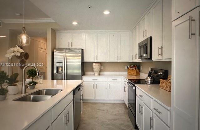 kitchen with white cabinetry and range with electric cooktop