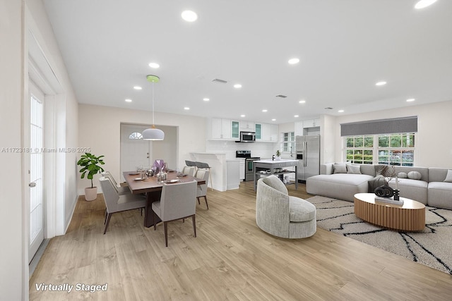 living room featuring light wood-type flooring