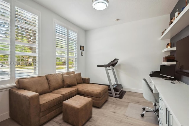 home office with light wood-type flooring