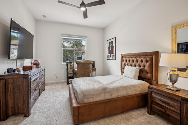 bedroom featuring light carpet and ceiling fan