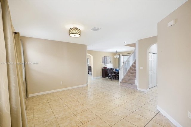 spare room with light tile patterned flooring