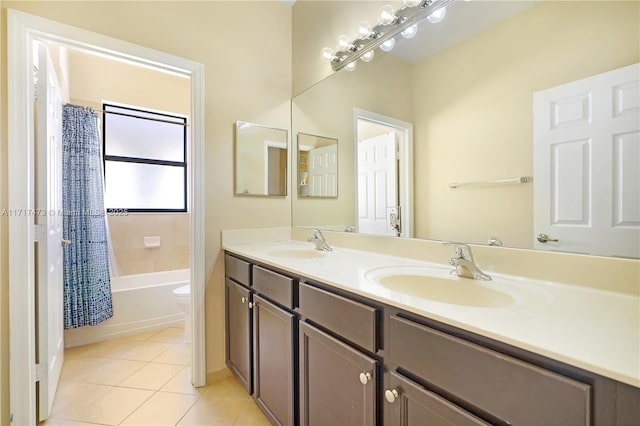 full bathroom with tile patterned flooring, vanity, shower / bath combination with curtain, and toilet