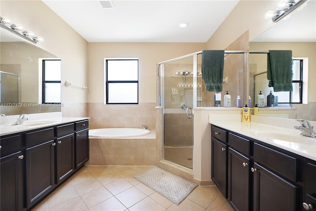 bathroom with vanity, separate shower and tub, and tile patterned floors