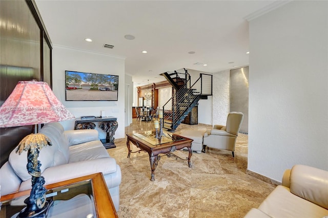 living room with ornamental molding