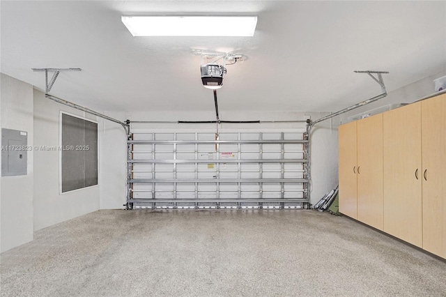 garage featuring a garage door opener and electric panel