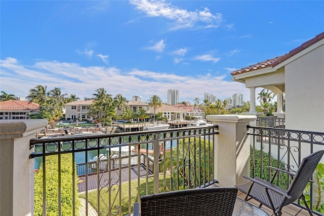 balcony featuring a water view