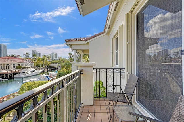 balcony featuring a water view