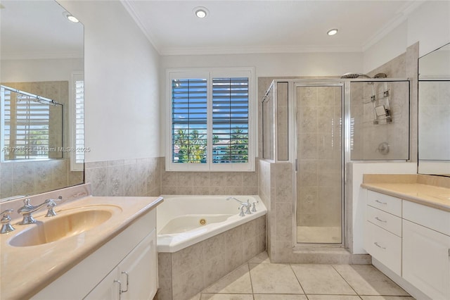 bathroom with tile patterned floors, vanity, separate shower and tub, and crown molding