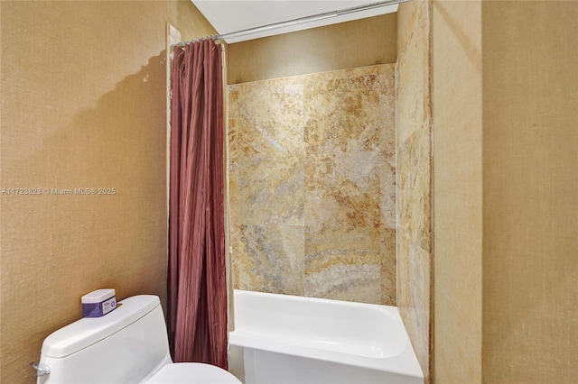 bathroom with shower / tub combo with curtain and toilet