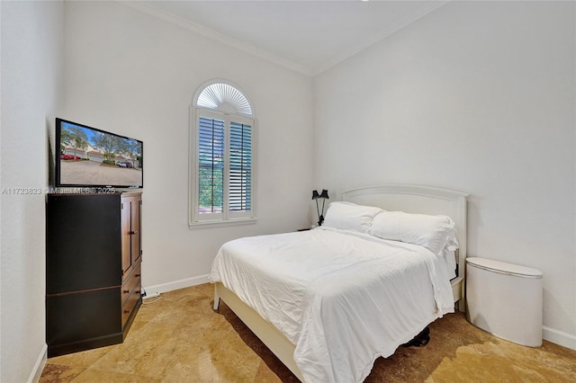 bedroom featuring crown molding