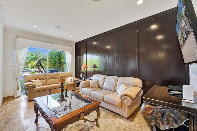 living room with ornamental molding