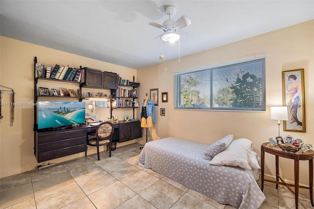 tiled bedroom featuring ceiling fan