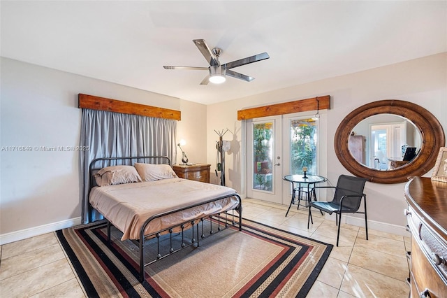 tiled bedroom with french doors, access to outside, and ceiling fan