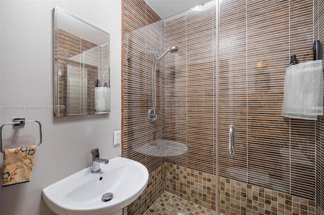 bathroom featuring sink and walk in shower