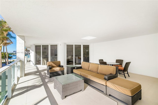 living room with light tile patterned flooring