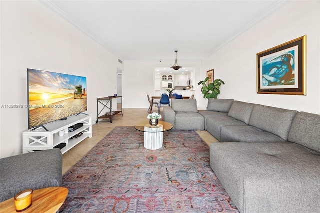 tiled living room featuring ornamental molding